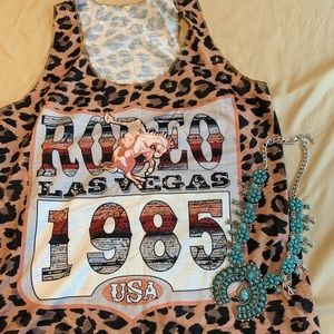 Graphic tank **BUY ONE GET ONE 1/2 OFF**